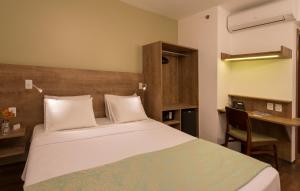 普拉亚都坎托司丽普酒店客房内的一张或多张床位
