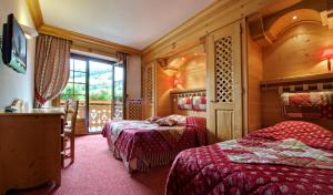 Hotel les Sapins客房内的一张或多张床位