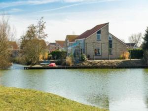 Bungalow in Zeeland with Stunning Waterside Views