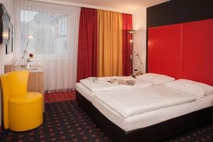 维也纳参议员酒店客房内的一张或多张床位
