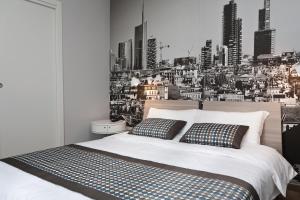 梅内基诺公寓式酒店客房内的一张或多张床位