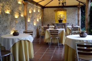 Hostal Villa Toscana餐厅或其他用餐的地方