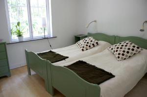 Ejagården B&B en suite客房内的一张或多张床位