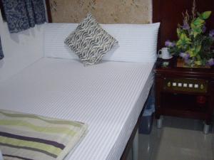 CANADIAN Hostel客房内的一张或多张床位