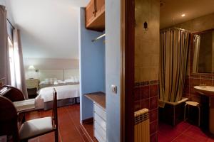 Hotel Rural El Yantar de Gredos客房内的一张或多张床位