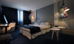 新科海博中心酒店客房内的一张或多张床位