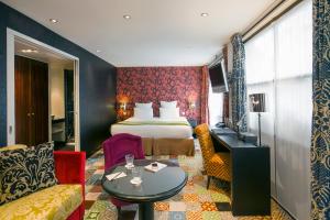 圣日耳曼碧蕾哈斯酒店客房内的一张或多张床位