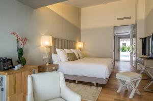 Puebloastur Eco Resort Hotel & Spa客房内的一张或多张床位