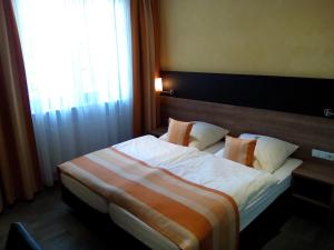 特鲁茨帕夫酒店客房内的一张或多张床位