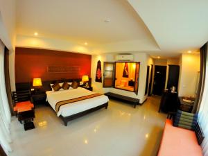 Navatara Phuket Resort - SHA Extra Plus客房内的一张或多张床位