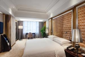 广州国德国际大酒店客房内的一张或多张床位