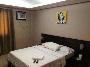 藏珠酒店（杰那斯奢华套房）客房内的一张或多张床位