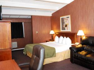 瓦特汤旅游小屋酒店客房内的一张或多张床位