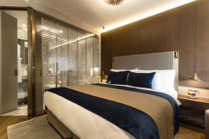 贵族22号套房公寓式酒店 - 特殊类别客房内的一张或多张床位