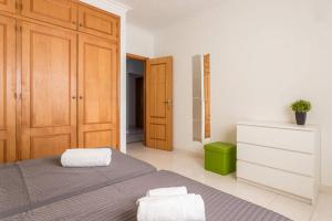Apartment in Albufeira客房内的一张或多张床位