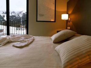 HG拉莫利纳酒店客房内的一张或多张床位