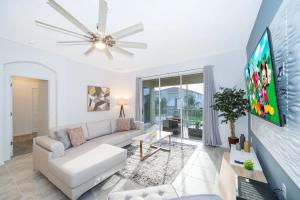 Disney-Themed Townhome in ChampionsGate Resort 15 min from Disney World with 7 Pools, Gym, Golf, Lazy River, Water Park, Arcades, Theatre, and More!