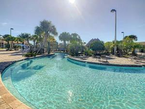Wonderful Disney-Themed Home in ChampionsGate Resort 15 min from Disney World with 7 pools, Club houses, Water Park, Gym, Arcades, Lazy River, Golf, and More!