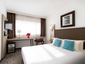 欧洲里尔酒店客房内的一张或多张床位
