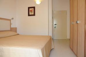 Hotel Saint Tropez SPA & Restaurant客房内的一张或多张床位