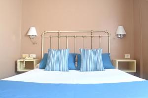 RF阿斯托利亚酒店 - 仅限成年人客房内的一张或多张床位