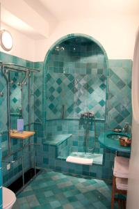 菲尔莫玫瑰迷人酒店的一间浴室