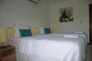 苏玛里别墅旅馆客房内的一张或多张床位