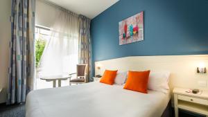 马尔索酒店客房内的一张或多张床位