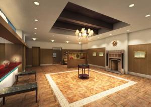 神户神户蒙特埃马纳酒店・艾美丽的一个带壁炉和壁炉的大型大堂