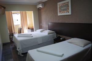堪丹戈埃罗酒店客房内的一张或多张床位