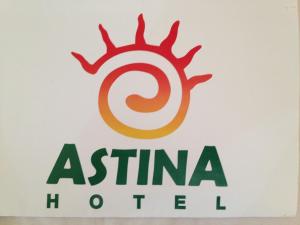 罗威那阿斯塔纳酒店的亚洲酒店标志,带有亚洲标志