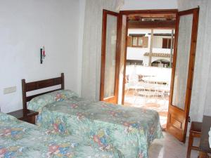 Pequeña Casa en la Playa de Pals客房内的一张或多张床位