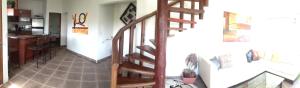 普拉亚卡门Quinta Palmeras的房屋内带螺旋楼梯的走廊