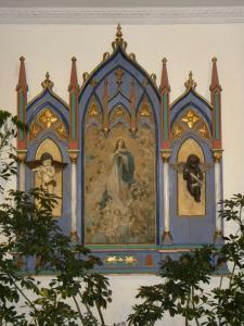 昆卡卡萨圣拉斐尔酒店的教堂墙上的画