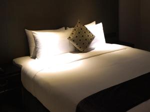 格诺莎阿南酒店客房内的一张或多张床位