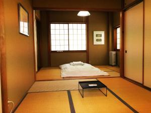 富山相见恨晚公寓客房内的一张或多张床位