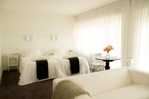 H＆R艾斯特莱拉卡里翁旅馆客房内的一张或多张床位