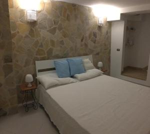 CasadAmare - Puglia Mia Apartments客房内的一张或多张床位