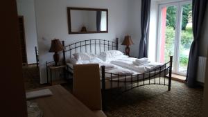 Hotel BouCZECH客房内的一张或多张床位