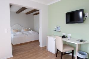 Frühstückshotel Seemannsbraut Amrum - adults only客房内的一张或多张床位