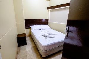 帕加迪安GV酒店客房内的一张或多张床位