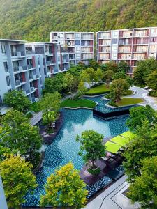 PhayayenThe Valley Escape สองห้องนอน สวย สงบ สบาย的享有公寓大楼空中美景,设有游泳池