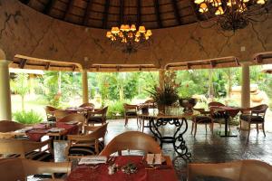 Summerfield Botanical Garden & Exclusive Resort餐厅或其他用餐的地方