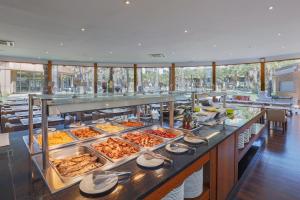 NAU Salgados Palm Village - All Inclusive餐厅或其他用餐的地方