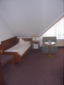 兹莫尔曼酒店客房内的一张或多张床位