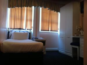 美人鱼套房酒店客房内的一张或多张床位