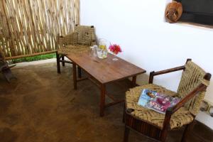 Sheba Cottages - Diani Beach的休息区