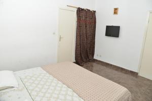 Hotel Residence Lobal客房内的一张或多张床位