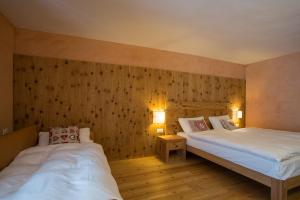 马尔加米尔葛洛贝北欧度假村客房内的一张或多张床位