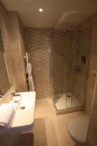 巴蒂尼奥勒埃克塞尔西奥酒店的一间浴室